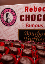 Box of Rebecca Ruth Chocolates Bourbon Truffles with a close-up view.
