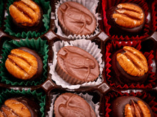 Assorted chocolate-pecan candies in colorful wrappers, alongside horse-shaped chocolates.