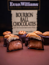 Evan Williams bourbon ball chocolates with a box in the background