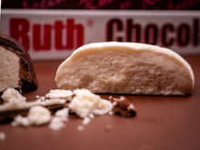 Close-up of a Kentucky Creamed Pull Candy with a visible brand name in the background
